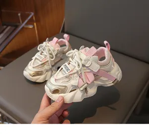 Detailed view of girls athletic sandals with breathable mesh and pink ribbon straps