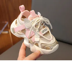 Detailed macro view of pink breathable mesh fabric and sturdy non-slip sole of kids sandals