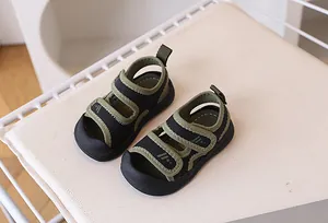 Detail of kids sport sandals with breathable mesh, anti-collision toe, and velcro straps