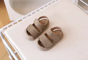 Detailed top view of khaki toddler sandals featuring anti-collision toe and dual velcro straps