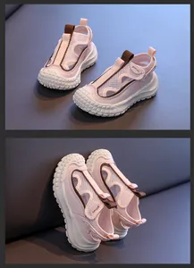 Detail of pink and white breathable mesh kids' sandals with anti-slip thick soles