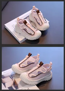 Detail of pink breathable mesh kids sneakers with crash-proof toe and velcro strap
