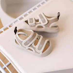 Beige and tan toddler summer sandals with double velcro straps and soft rubber soles