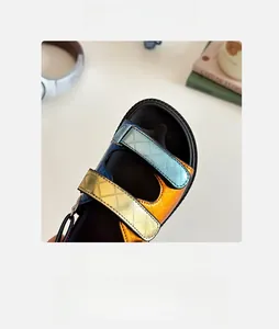 Detail of colorful metallic quilted straps and round toe design on children's sandals