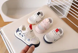 Close-up of breathable mesh fabric and velcro strap on toddler sneakers with panda decor