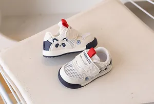Detail of breathable mesh toddler sneaker with cute panda design and velcro closure