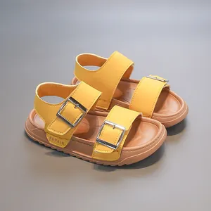 Bright yellow open-toe kids sandals with soft non-slip soles and adjustable straps