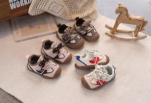 Three pairs of soft leather baby sneakers in brown, pink, and tricolor with toe protection