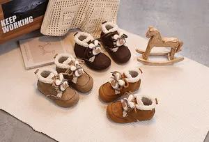 Winter baby snow boots in brown, khaki, and yellow with plush lining and cute rabbit ears