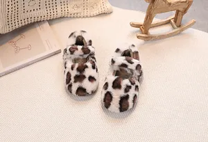 Detail of leopard print faux fur baby shoes with cozy plush lining and velcro strap