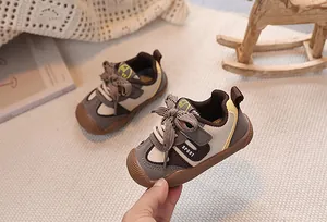 Close-up of baby walking shoes showing anti-collision toe cap and velcro strap