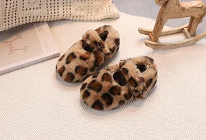 Detail shot of plush leopard print baby Mary Jane shoes with cozy faux fur material