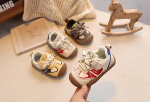 Detailed view of kids' sports shoes featuring durable rubber anti-collision toe caps
