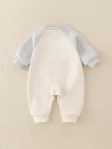 Pagliaccetto neonato carino in morbido cotone panna e grigio con polsini a coste
