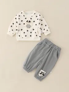 Completo neonato primaverile con felpa a pois e pantaloni grigi con fumetti