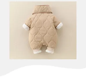 Close-up of khaki quilted baby romper with plush lining and ribbed cuffs for winter