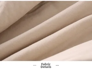 Macro shot of soft cotton beige fabric texture with fine stitching for baby romper