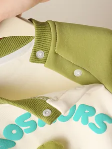 Infant dinosaur tracksuit with ribbed crewneck and side buttons in cream and green