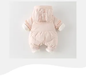 Detail of pink baby down snowsuit showing rabbit ear hood and ruffled shoulder accents