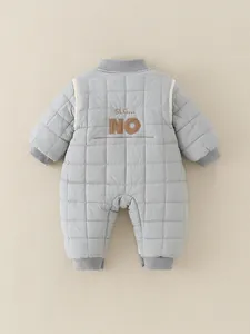 Padded blue infant romper with quilted check pattern and decorative back embroidery