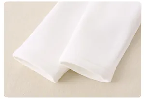 Close-up of thick fleece infant jacket sleeve showing clean double-needle stitching