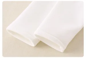 Detailed macro view of white winter fleece cuff with premium double-needle stitching