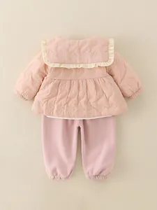 Baby girl pink quilted jacket with ruffle collar and matching knit pants winter set