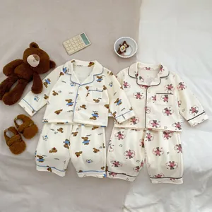 Cute cartoon bear pattern baby pajama sets with long sleeves and button-up cardigans