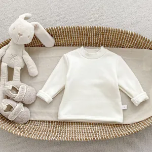 Detailed view of baby thermal inner shirt showing plush lining texture and size 66 tag