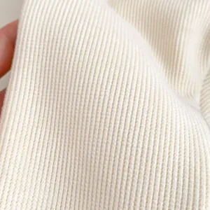 Pantaloni a campana per bambine in caldo tessuto a costine con interno in pile