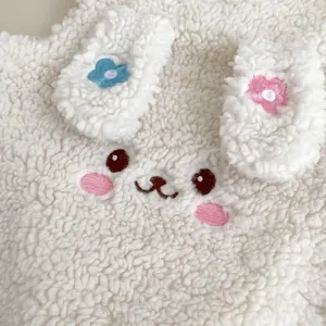 Cute white fleece baby bunny romper with floral ear embroidery and soft fuzzy texture