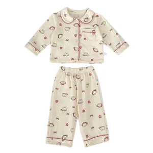 Pijama de manga larga para niña pequeña con estampado de perrito y fresa blanco crema