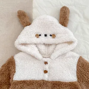 Detail of baby bear hoodie with cute 3D ears and soft sherpa fleece fabric