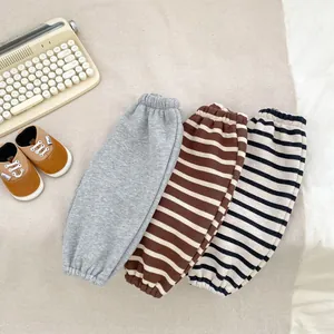 Pantalon d'hiver pour bébé à rayures et couleurs unies avec chaussures de marche