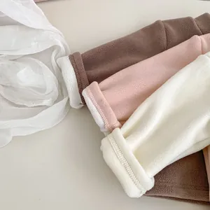 Detail of warm winter thermal tops for kids with thick fleece lining and soft texture