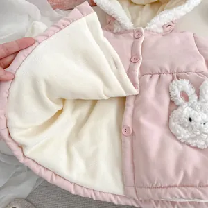 Thick pink hooded winter jacket for girls featuring a cute 3D bunny patch and fleece lining