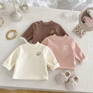 Detailed view of kids thick fleece shirts with cute bear embroidery in three warm colors