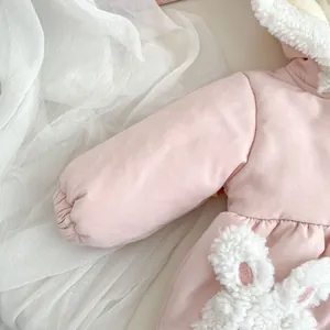 Detail of pink toddler winter jacket with 3D bunny applique and faux fur trim