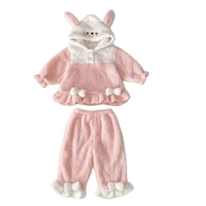 Pink coral fleece baby pajama set with cute rabbit ears and ruffled edges for winter