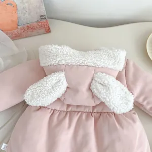 Detail of pink toddler winter coat with fluffy rabbit ears and faux lamb wool hood