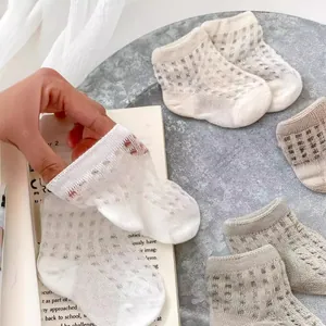Breathable mesh cotton baby socks in neutral colors for summer comfort and elasticity