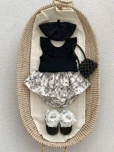 Baby floral tiered bloomers and knit ruffle top set with tiny woven handbag detail