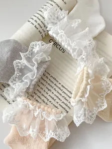 Breathable mesh lace princess socks for baby girls in pastel white and pink colors