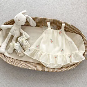 Detailed embroidery on tulle baby romper dress with matching soft sole bow shoes