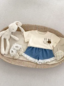 Toddler summer outfit with cartoon bunny tee and lace-trimmed denim shorts for girls