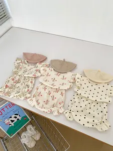 Ensembles d'été bébé fille avec hauts à volants et bloomers à motifs fleurs et lapins