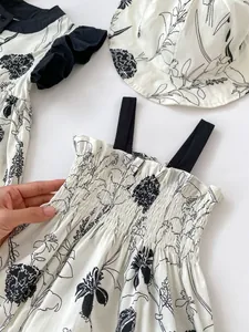 Detail view of the stretchy elastic bodice on a floral summer baby girl dress