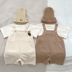 Baby cotton romper sets with short sleeve t-shirts and beanies in beige and brown