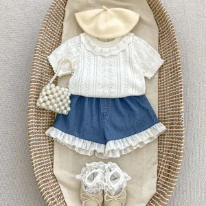 Baby girl summer knit top and denim shorts set with elegant lace details and beret