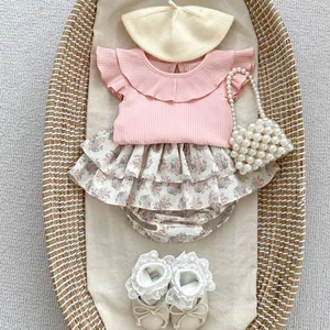 Baby girl pink ribbed flutter sleeve top and floral skirt set with accessories